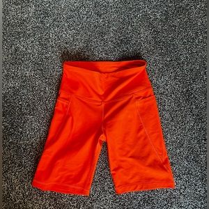 Orange gym shorts